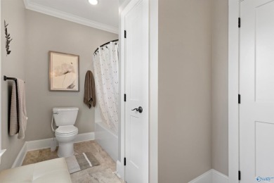 Discover refined Southern living in this stunning 3 bed, 3 bath on Gunters Landing in Alabama - for sale on GolfHomes.com, golf home, golf lot
