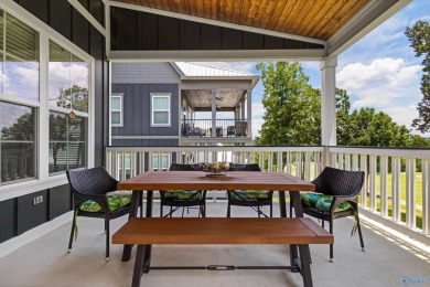 Discover refined Southern living in this stunning 3 bed, 3 bath on Gunters Landing in Alabama - for sale on GolfHomes.com, golf home, golf lot