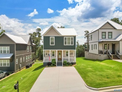 Discover refined Southern living in this stunning 3 bed, 3 bath on Gunters Landing in Alabama - for sale on GolfHomes.com, golf home, golf lot