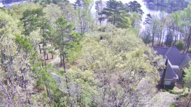Discover the perfect setting for your forever home on this on Old North State Club at Uwharrie Point Golf community in North Carolina - for sale on GolfHomes.com, golf home, golf lot