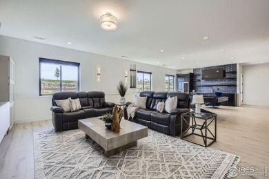 Welcome to elevated Colorado living at its finest. Perched above on Raindance National Golf Course in Colorado - for sale on GolfHomes.com, golf home, golf lot