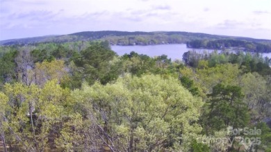 Discover the perfect setting for your forever home on this on Old North State Club at Uwharrie Point Golf community in North Carolina - for sale on GolfHomes.com, golf home, golf lot