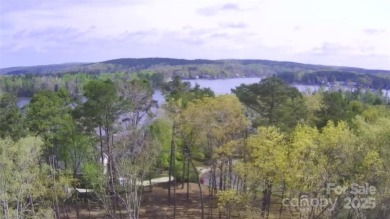 Discover the perfect setting for your forever home on this on Old North State Club at Uwharrie Point Golf community in North Carolina - for sale on GolfHomes.com, golf home, golf lot