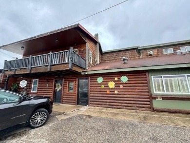 Investment Opportunity in Boyne Falls! Location, location on Boyne Mountain Resort - Alpine in Michigan - for sale on GolfHomes.com, golf home, golf lot
