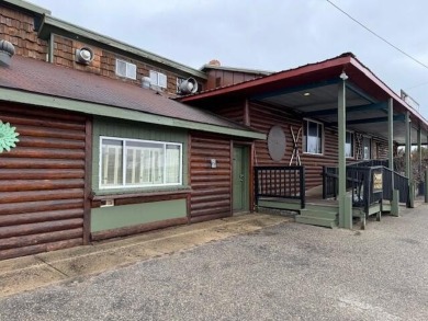 Investment Opportunity in Boyne Falls! Location, location on Boyne Mountain Resort - Alpine in Michigan - for sale on GolfHomes.com, golf home, golf lot