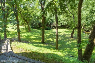 This magnificent all-brick estate rests on a prime 1.2-acre on Wynstone Golf Club in Illinois - for sale on GolfHomes.com, golf home, golf lot