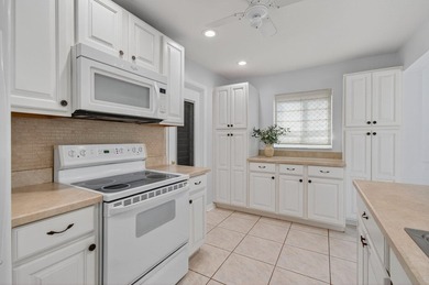 Welcome to your slice of paradise in this vibrant 55+ golf on Leisureville Community Golf Course in Florida - for sale on GolfHomes.com, golf home, golf lot