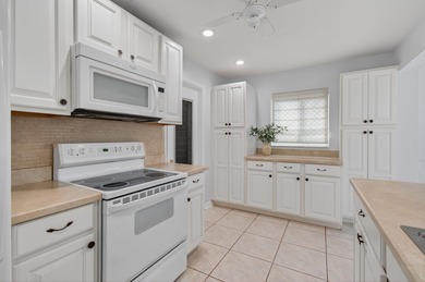 Welcome to your slice of paradise in this vibrant 55+ golf on Leisureville Community Golf Course in Florida - for sale on GolfHomes.com, golf home, golf lot