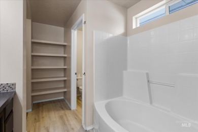 This spacious 3 bedroom, 2 bath home features an open concept on Hunters Point Golf Club in Idaho - for sale on GolfHomes.com, golf home, golf lot