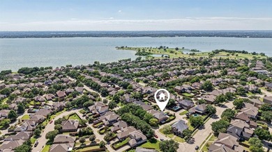 Welcoming updated 4-bedroom home in prime location! Curb appeal on The Shores Country Club in Texas - for sale on GolfHomes.com, golf home, golf lot