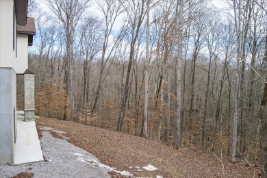 This home is partially completed and is selling as it currently on Sparta Golf and Country Club in Tennessee - for sale on GolfHomes.com, golf home, golf lot