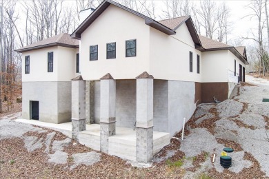 This home is partially completed and is selling as it currently on Sparta Golf and Country Club in Tennessee - for sale on GolfHomes.com, golf home, golf lot