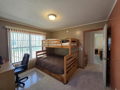 Your Forever Home or Perfect Up-North Oasis! Discover comfort on Michaywe Pines Course in Michigan - for sale on GolfHomes.com, golf home, golf lot