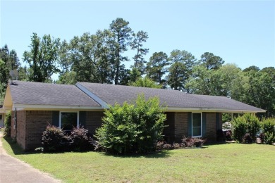 Welcome home to 1314 E Todd Street, in a prime location right on Pine Hills Country Club in Louisiana - for sale on GolfHomes.com, golf home, golf lot