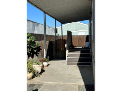 **Charming 3-Bedroom, 2-Bathroom Manufactured Home in Prime on Green River Golf Club in California - for sale on GolfHomes.com, golf home, golf lot