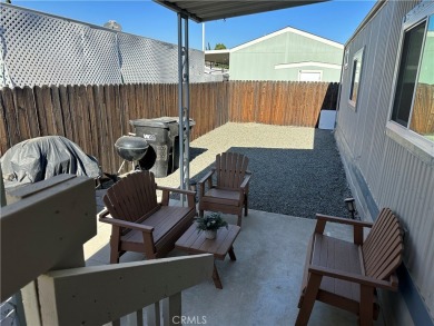 **Charming 3-Bedroom, 2-Bathroom Manufactured Home in Prime on Green River Golf Club in California - for sale on GolfHomes.com, golf home, golf lot