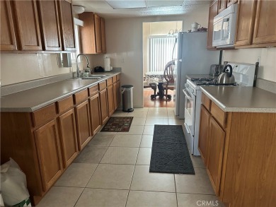 **Charming 3-Bedroom, 2-Bathroom Manufactured Home in Prime on Green River Golf Club in California - for sale on GolfHomes.com, golf home, golf lot