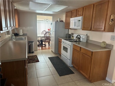 **Charming 3-Bedroom, 2-Bathroom Manufactured Home in Prime on Green River Golf Club in California - for sale on GolfHomes.com, golf home, golf lot