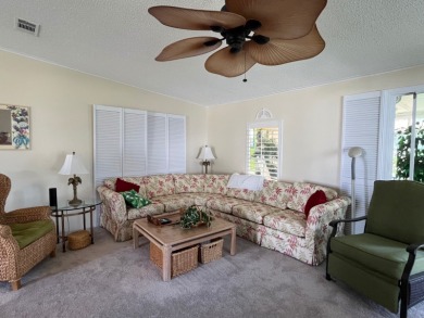 Welcome to this charming two-bedroom, two-bath home located in on Pine Lakes Country Club in Florida - for sale on GolfHomes.com, golf home, golf lot