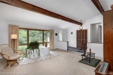 Step into this one-of-a-kind mid-century modern home tucked away on Kensington Metropark Golf Course in Michigan - for sale on GolfHomes.com, golf home, golf lot