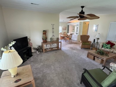 Welcome to this charming two-bedroom, two-bath home located in on Pine Lakes Country Club in Florida - for sale on GolfHomes.com, golf home, golf lot
