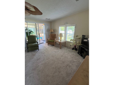 Welcome to this charming two-bedroom, two-bath home located in on Pine Lakes Country Club in Florida - for sale on GolfHomes.com, golf home, golf lot