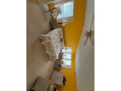 Welcome to this charming two-bedroom, two-bath home located in on Pine Lakes Country Club in Florida - for sale on GolfHomes.com, golf home, golf lot