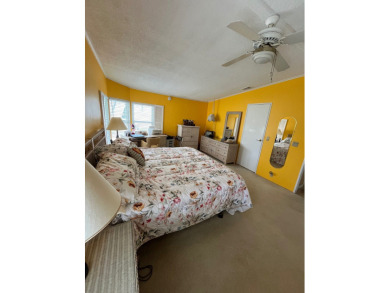 Welcome to this charming two-bedroom, two-bath home located in on Pine Lakes Country Club in Florida - for sale on GolfHomes.com, golf home, golf lot