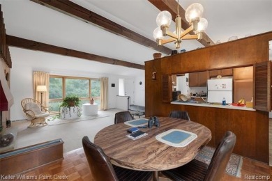 Step into this one-of-a-kind mid-century modern home tucked away on Kensington Metropark Golf Course in Michigan - for sale on GolfHomes.com, golf home, golf lot