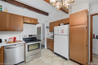 Step into this one-of-a-kind mid-century modern home tucked away on Kensington Metropark Golf Course in Michigan - for sale on GolfHomes.com, golf home, golf lot