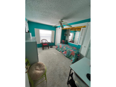 Welcome to this charming two-bedroom, two-bath home located in on Pine Lakes Country Club in Florida - for sale on GolfHomes.com, golf home, golf lot