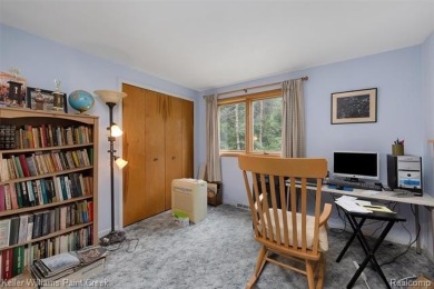 Step into this one-of-a-kind mid-century modern home tucked away on Kensington Metropark Golf Course in Michigan - for sale on GolfHomes.com, golf home, golf lot