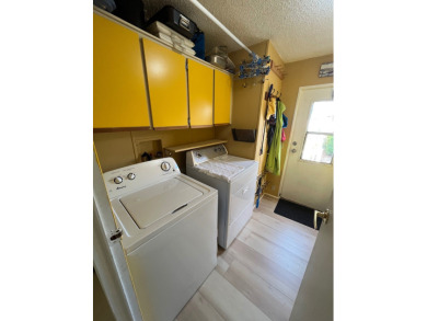 Welcome to this charming two-bedroom, two-bath home located in on Pine Lakes Country Club in Florida - for sale on GolfHomes.com, golf home, golf lot