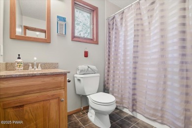 Welcome to 101 Blueridge Lane -- your private retreat in the on Lords Valley Country Club, Inc in Pennsylvania - for sale on GolfHomes.com, golf home, golf lot