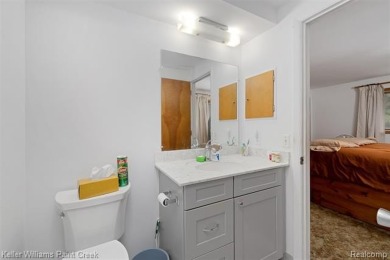 Step into this one-of-a-kind mid-century modern home tucked away on Kensington Metropark Golf Course in Michigan - for sale on GolfHomes.com, golf home, golf lot