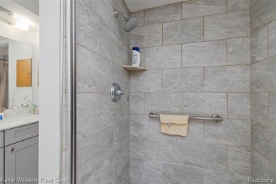 Step into this one-of-a-kind mid-century modern home tucked away on Kensington Metropark Golf Course in Michigan - for sale on GolfHomes.com, golf home, golf lot