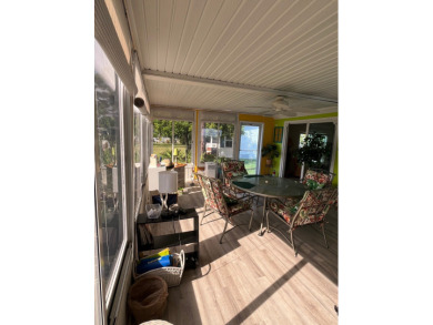 Welcome to this charming two-bedroom, two-bath home located in on Pine Lakes Country Club in Florida - for sale on GolfHomes.com, golf home, golf lot