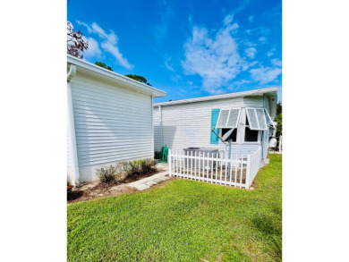 Welcome to this charming two-bedroom, two-bath home located in on Pine Lakes Country Club in Florida - for sale on GolfHomes.com, golf home, golf lot