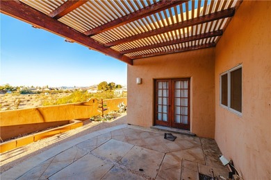 This HOME has majestic panoramic views of the Cerbat, Hualapai on Valle Vista Golf Course in Arizona - for sale on GolfHomes.com, golf home, golf lot