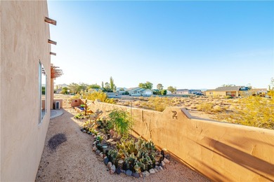 This HOME has majestic panoramic views of the Cerbat, Hualapai on Valle Vista Golf Course in Arizona - for sale on GolfHomes.com, golf home, golf lot