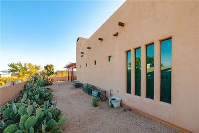 This HOME has majestic panoramic views of the Cerbat, Hualapai on Valle Vista Golf Course in Arizona - for sale on GolfHomes.com, golf home, golf lot