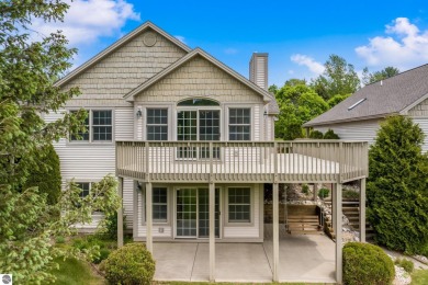 Enjoy the ease of main-floor living in this beautifully on Crown Golf Course in Michigan - for sale on GolfHomes.com, golf home, golf lot