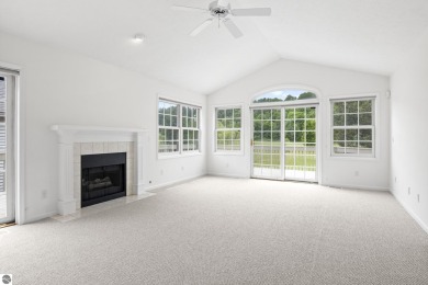 Enjoy the ease of main-floor living in this beautifully on Crown Golf Course in Michigan - for sale on GolfHomes.com, golf home, golf lot