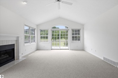 Enjoy the ease of main-floor living in this beautifully on Crown Golf Course in Michigan - for sale on GolfHomes.com, golf home, golf lot
