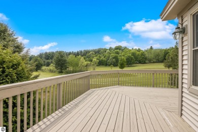 Enjoy the ease of main-floor living in this beautifully on Crown Golf Course in Michigan - for sale on GolfHomes.com, golf home, golf lot