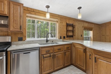 Welcome to this beautifully updated 4-bedroom, 2-bath ranch home on Indian River Golf Club in Michigan - for sale on GolfHomes.com, golf home, golf lot