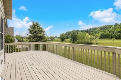 Enjoy the ease of main-floor living in this beautifully on Crown Golf Course in Michigan - for sale on GolfHomes.com, golf home, golf lot