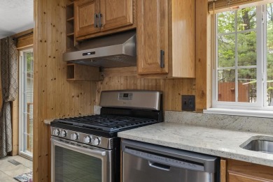 Welcome to this beautifully updated 4-bedroom, 2-bath ranch home on Indian River Golf Club in Michigan - for sale on GolfHomes.com, golf home, golf lot