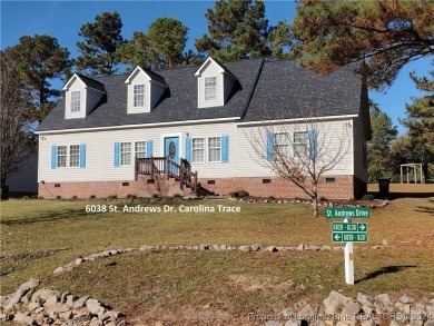 If you are looking for a gated community with water, fishing on Carolina Trace Country Club in North Carolina - for sale on GolfHomes.com, golf home, golf lot