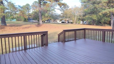 If you are looking for a gated community with water, fishing on Carolina Trace Country Club in North Carolina - for sale on GolfHomes.com, golf home, golf lot